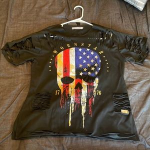 Cute “shredded” look shirt.